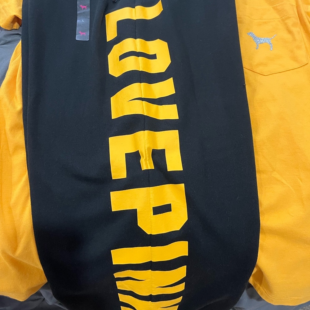 Pink black and yellow sweatpants size large never worn